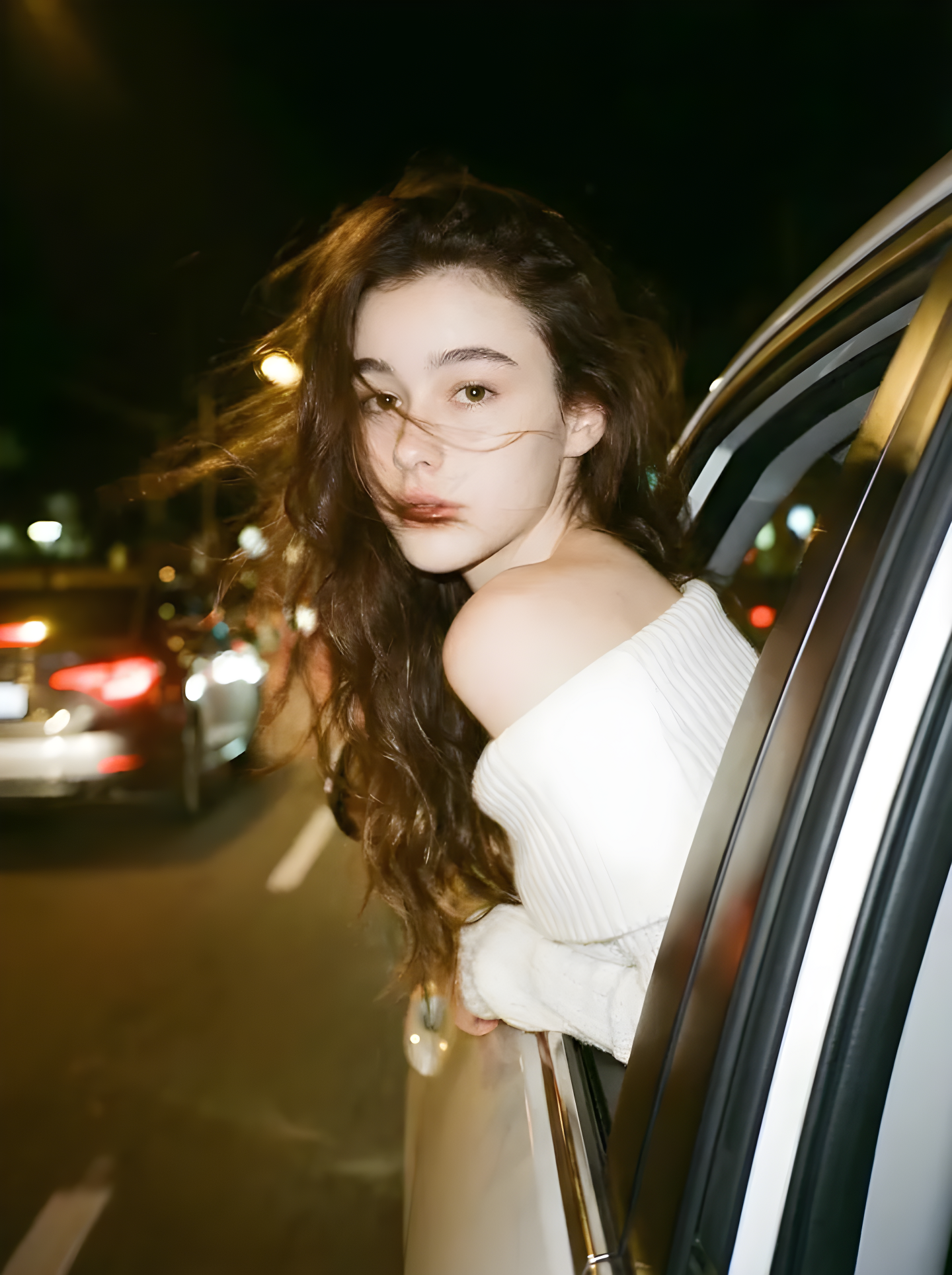Wearing Off-Shoulder White Knit Top