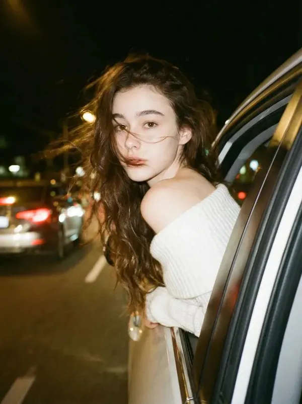 Wearing Off-Shoulder White Knit Top