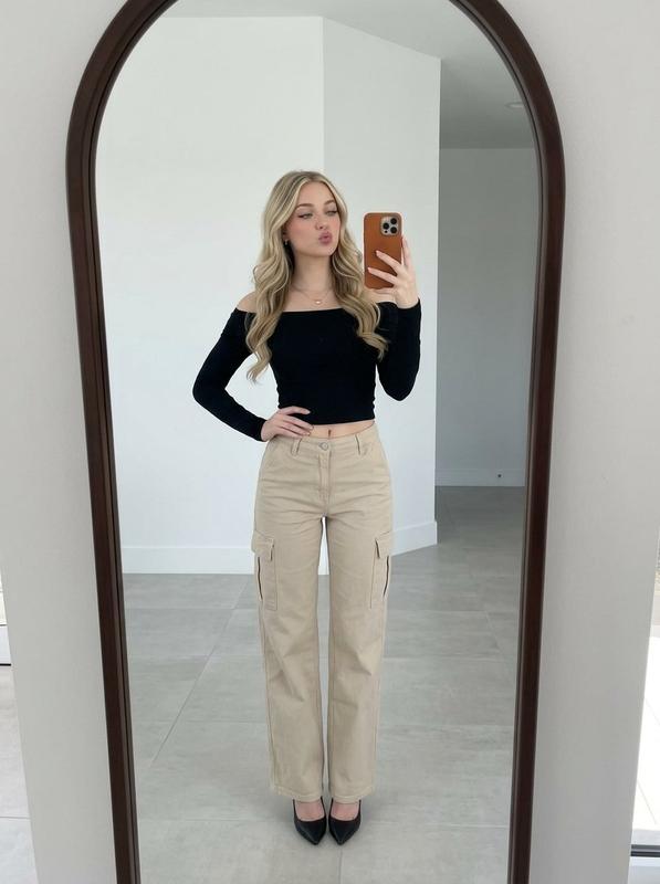 Arched Mirror Selfie Blonde Wavy Hair Cargo Pants Heels Portrait