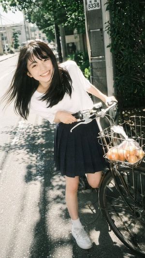 Girl Riding Bicycle