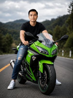 绿色运动摩托车与山路