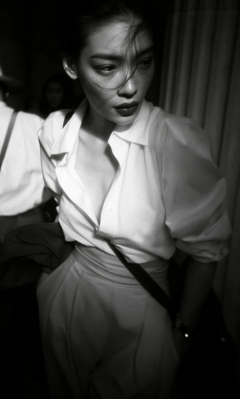 poetic half body shot an east asian supermodel summer...