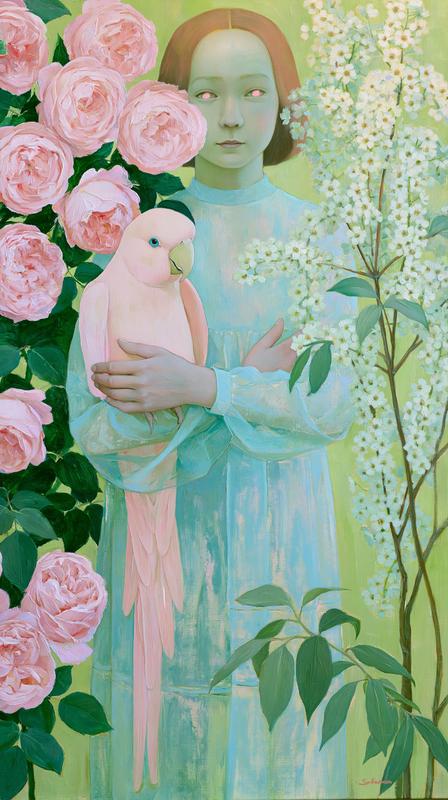 A girl in a soft pastel blue dress slightly...
