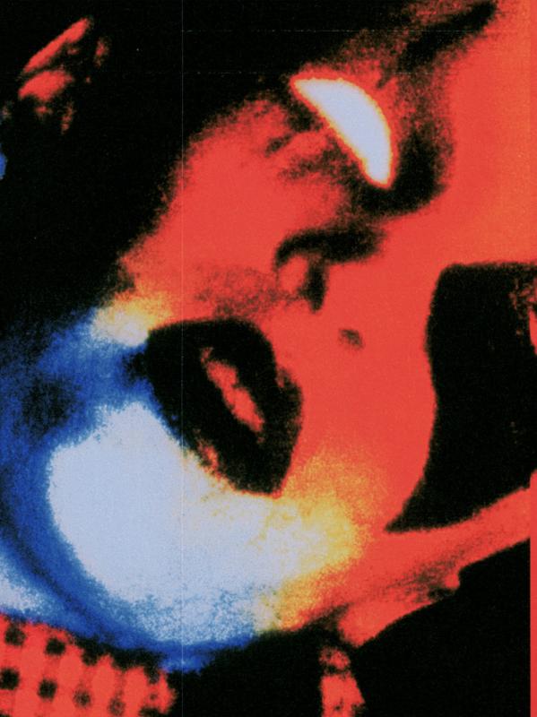 inverted thermographic close-up of a harlequin face tilted up...