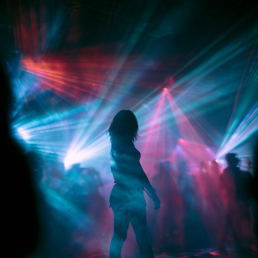 a photograph of a rave scene noisy and blurry...