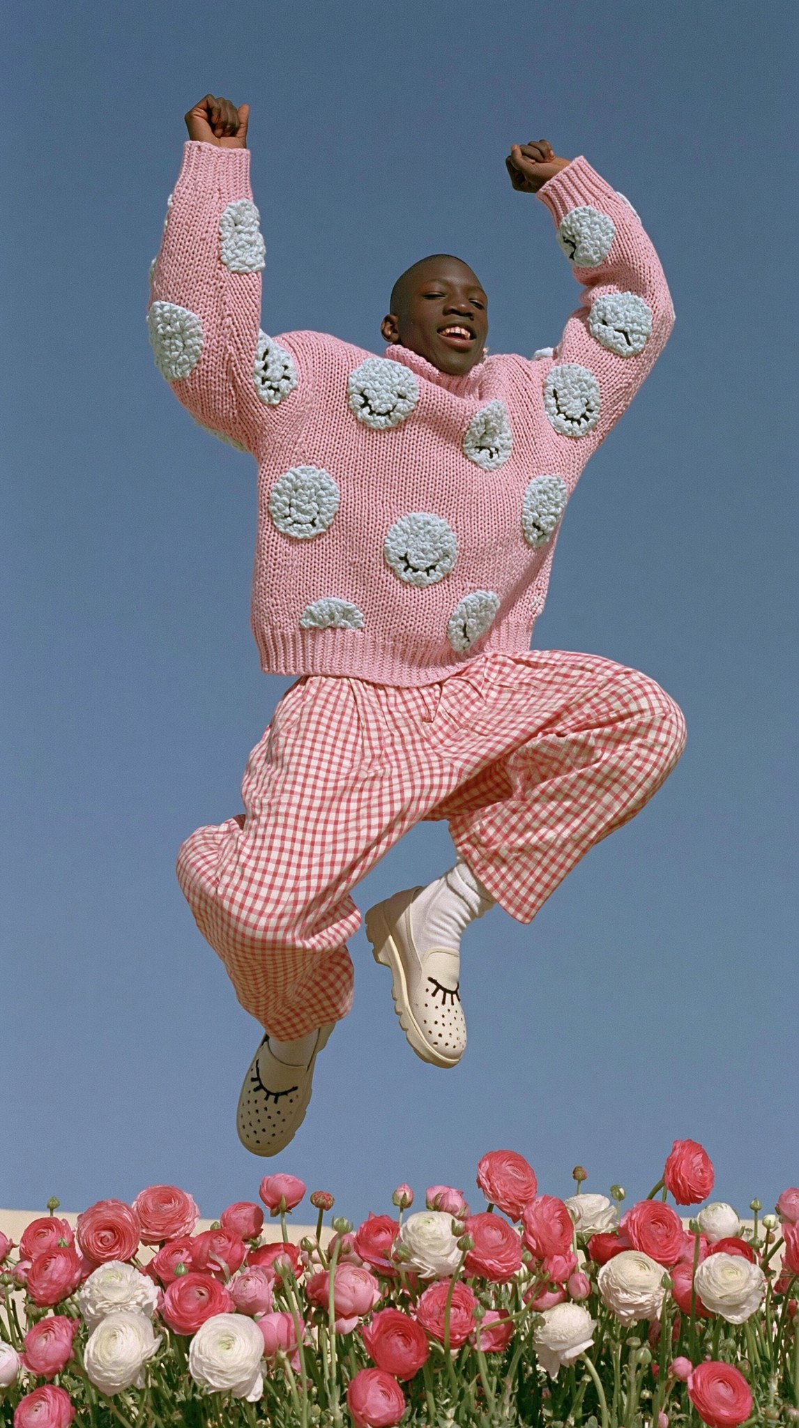 a black male dancing in a pastel dream strange...