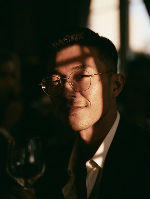 Photorealistic portrait of a 28-year-old East Asian male sharp...