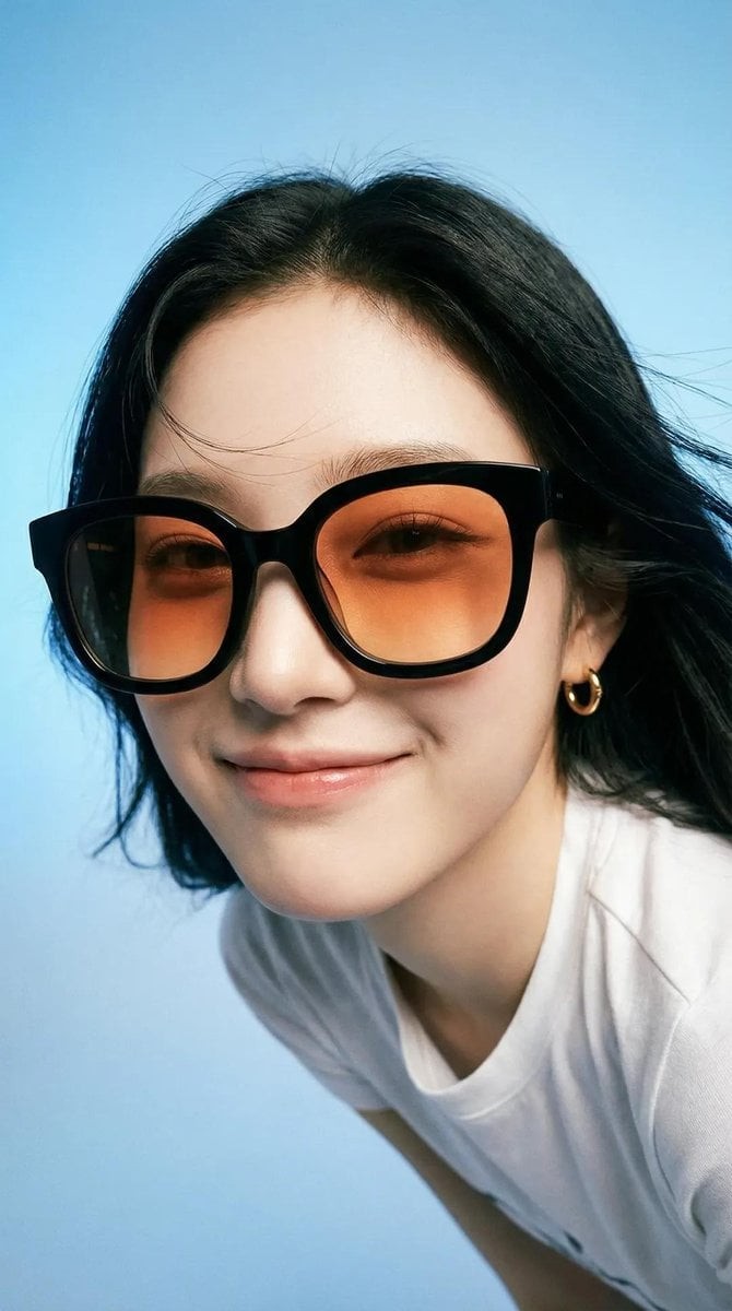 Orange-Lens Sunglasses Studio Portrait