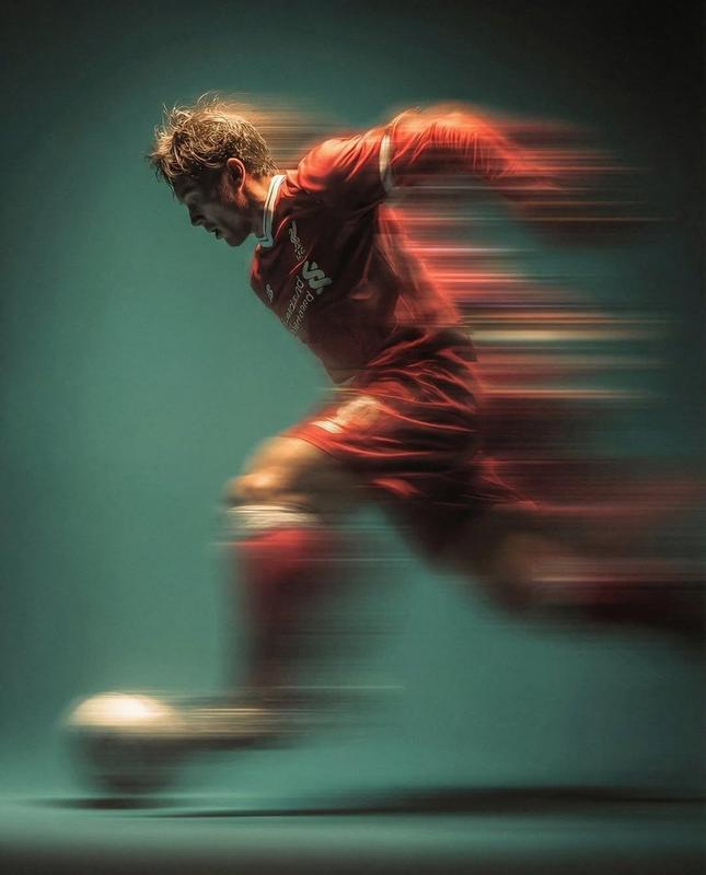 Red Soccer Player Panning Kick