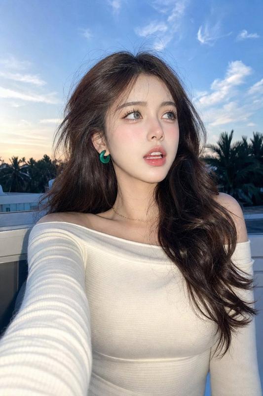 Blue-Hour Rooftop High-Angle Selfie